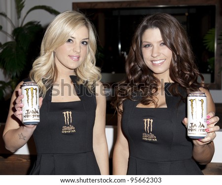 NEW YORK - FEBRUARY 14: Sales girls display soft drink Java Monster during Fashion week at Metropolitan Pavilion in Manhattan on February 14, 2012 in New York City.