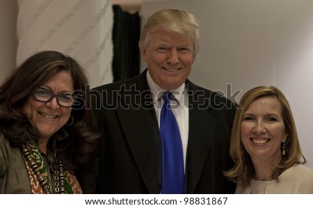 NEW YORK - MARCH 28: (L-R) Fern Mallis, Donald Trump & guest attend the Ivanka Trump New Ready-To-Wear Collection launch at Lord & Taylor on March 28, 2012 in New York City.
