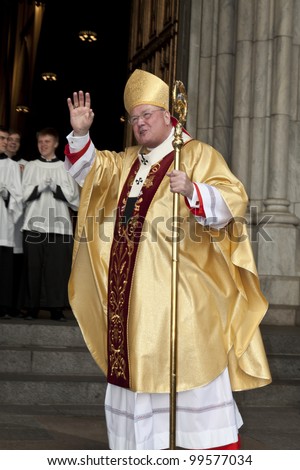 NEW YORK - APRIL 08: Cardinal Dolan greets worshippers and guests on the steps of Saint Patrick\'s Cathedral in Manhattan after Easter mass on April 8, 2012 in New York City
