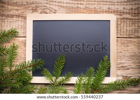 Christmas menu blackboard and wooden background.