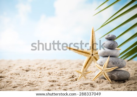 Stones spa treatment scene on the sea beach, zen like concepts.