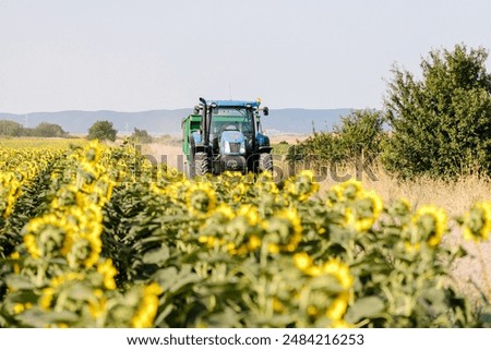 Similar – Foto Bild Traktor auf Feld in Abendsonne