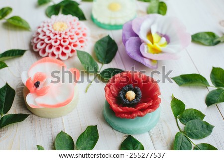 Flower soap on a wooden table