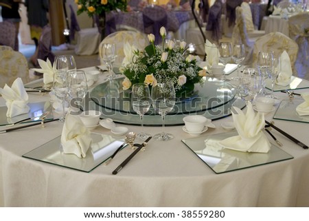A interior shot of a chinese restaurant before a wedding banquet.
