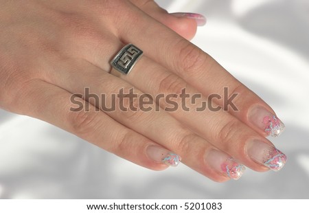Female hands displaying beautiful polished nails