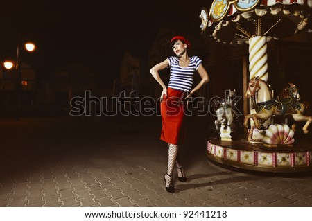 pin up girls in a Parisian style, outside at night, retro stylized photo