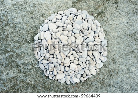Abstract background. Coastal pebbles in round shape