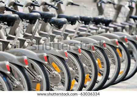 Group of bicycles in the row.  Photo with tilt-shift lens