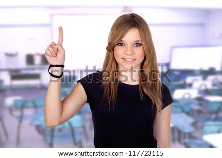 Winner blond woman with black shirt asking to speak in the university