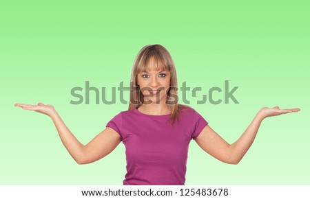 Attractive girl with the arms extended isolated on green background
