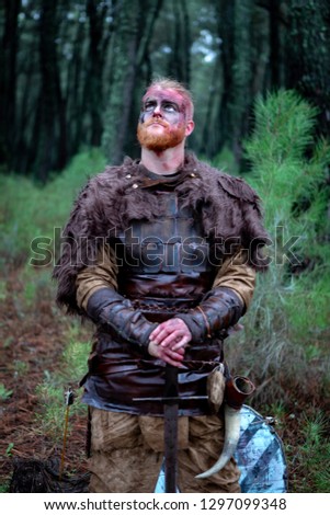 Similar – Image, Stock Photo Bloody real viking with his sword training for combat