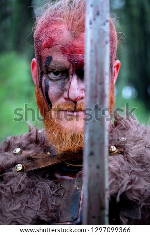 Similar – Image, Stock Photo Bloody real viking with his sword training for combat