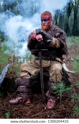 Similar – Image, Stock Photo Bloody real viking with his sword training for combat