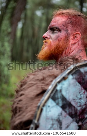 Similar – Image, Stock Photo Bloody real viking with his sword training for combat