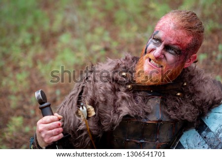 Similar – Image, Stock Photo Bloody real viking with his sword training for combat