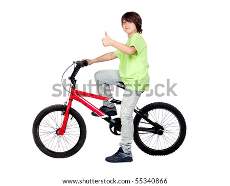 Funny child practicing bike isolated on white background