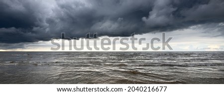 Similar – Image, Stock Photo Picturesque scenery of coastal town surrounded by sea