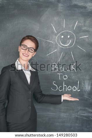 Happy teacher with smiling sun and phrase Homework