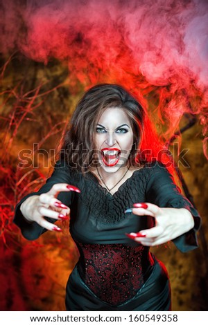 Angry halloween beautiful vampire