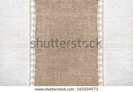 Burlap background and linen lacy cloth