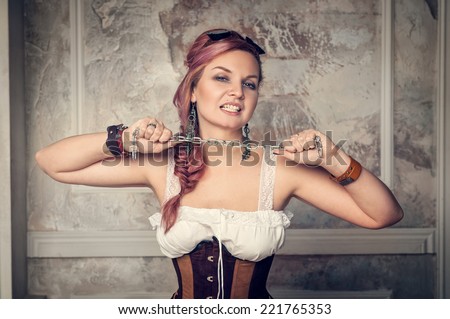 Beautiful steampunk woman with metal chain
