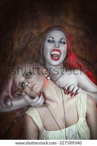 Beautiful vampire woman and her victim in the hell