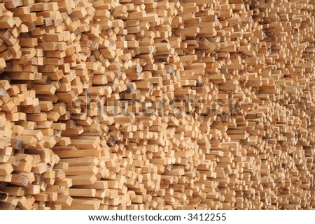 A huge pile of pine wood sticks