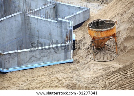 construction building site pouring concrete in form sand
