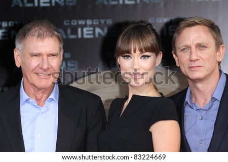 BERLIN, GERMANY - AUGUST 08: Harrison Ford, Olivia Wilde and Daniel Craig attend the \'Cowboys and Aliens\' Premiere in Cinestar on August 8, 2011 in Berlin, Germany.