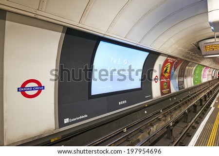 LONDON - JUNE 7: Inside view of London underground on June 7, 2014 in London, UK. London\'s system is the oldest underground railway in the world, dating back to 1863.