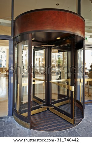 BRUSSELS,BELGIUM - 29 AUGUST 2015: The main entrance and the Glass revolving door at Hotel Hilton Grand Place in Brussels on 29 August 2015