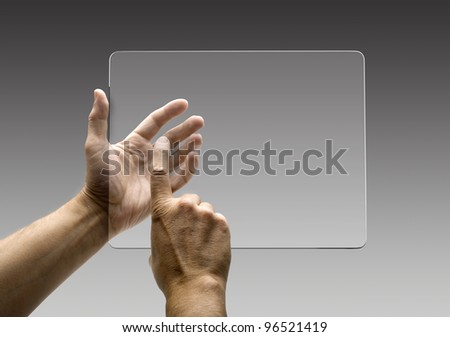 hands reaching images on a futuristic tablet