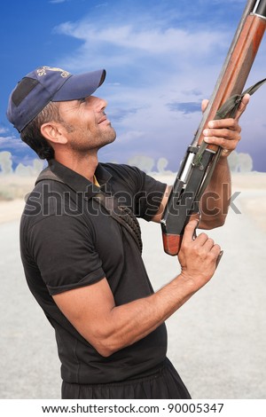 security guard holding gun