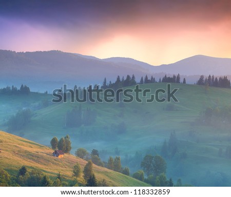Summer landscape in the mountains village. Sunrise