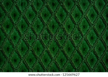 Close up of dark green colored wool textile in Hi-Res