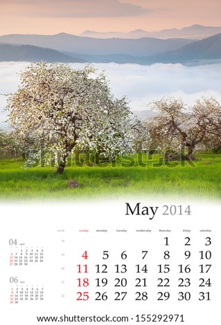 2014 Calendar. May. Blooming apple trees in the mountains in spring