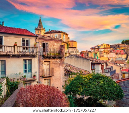 Сharm of the ancient cities of Europe. Wonderful cityscape of Novara di Sicilia town. Colorful spring sunrise in Sicily, Italy, Europe. Beautiful world of Mediterranean countries. 