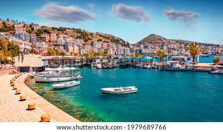 Perfect spring cityscape of Saranda port. Picturesque Ioninian seascape. Bright morning scene of Albania, Europe. Traveling concept background.