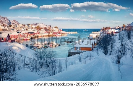 Beautiful winter scenery. Sunny morning scene of Lofoten Islands. Amazing snowy cityscape of Sorvagen town, Norway, Europe. Splendid morning seascape of Norwegian sea. Foto stock © 