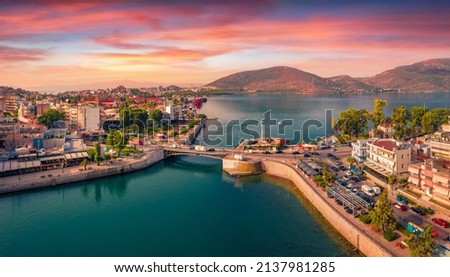 Splendid summer view from flying drone of Chalcis town with Chalkida's Old Bridge, Greece, Europe. Spectacular sunrise on Euboea island, Greece, Europe. Traveling concept background. Foto stock © 