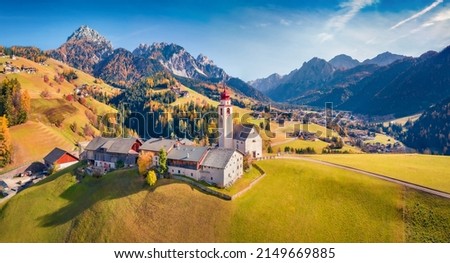 Amazing autumn view from flying drone of Dlijia Da Curt Catholic church, Mareo, Province of Bolzano - South Tyrol, Italy, Europe. Stunning morning scene of Dolomite Alps. Traveling concept background. Imagine de stoc © 