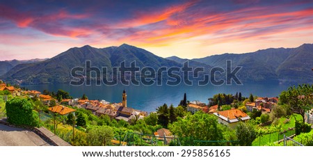 Colorful summer sunrise on the town of Carate Urio, on Lake Como. Alps, Italy, Lombardi, Europe.