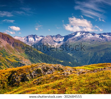 The majestic snow-capped Swiss Alps from the Grimselpass. Colorful sunny morning in the Alps, Switzerland, Europe.
