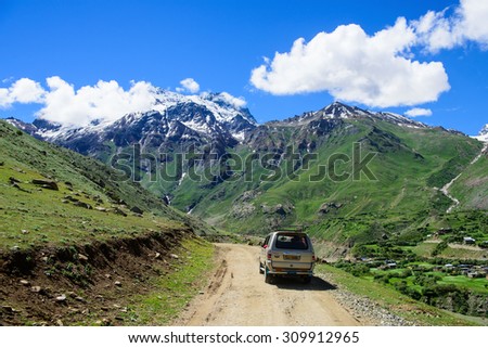 KASHMIR, INDIA - July 14 : Car tourist on the way go to snow moutain on July 14,2015 in KASHMIR, INDIA