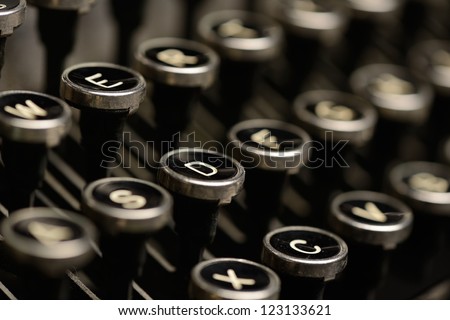 Close-up of antique typewriter keys. Close-up of keys on an old typewriter. Very shallow DOF.