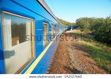 Motion train and blue wagon. Urban transportation