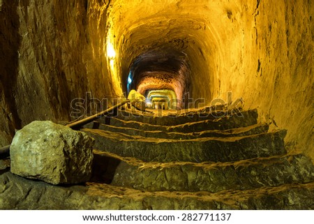 Mysterious dungeon- tunnel with walls made of stone