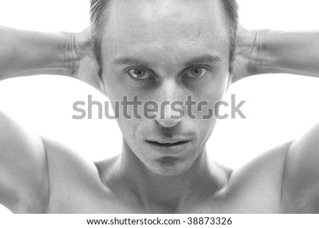 Black-and-white portrait of muscular man isolated on white