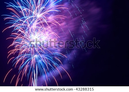 Beautiful fireworks with copyspace left or right.