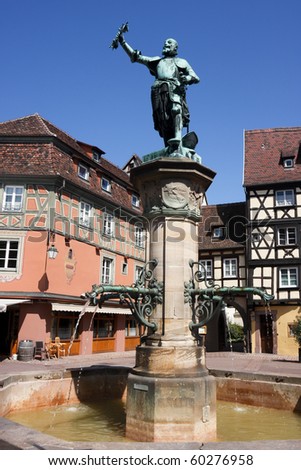 Statue and Fountain in central square of Colmar, France